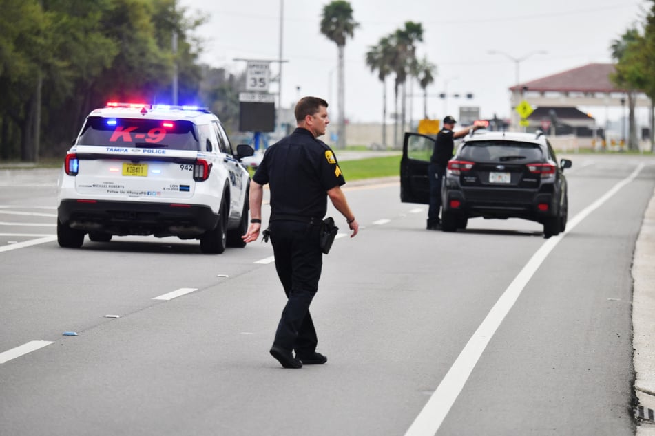Tampa police block traffic along South Dale Mabry Highway near the main entrance of MacDill Air Force Base after a suspicious package was reported at the gate on March 16, 2026.