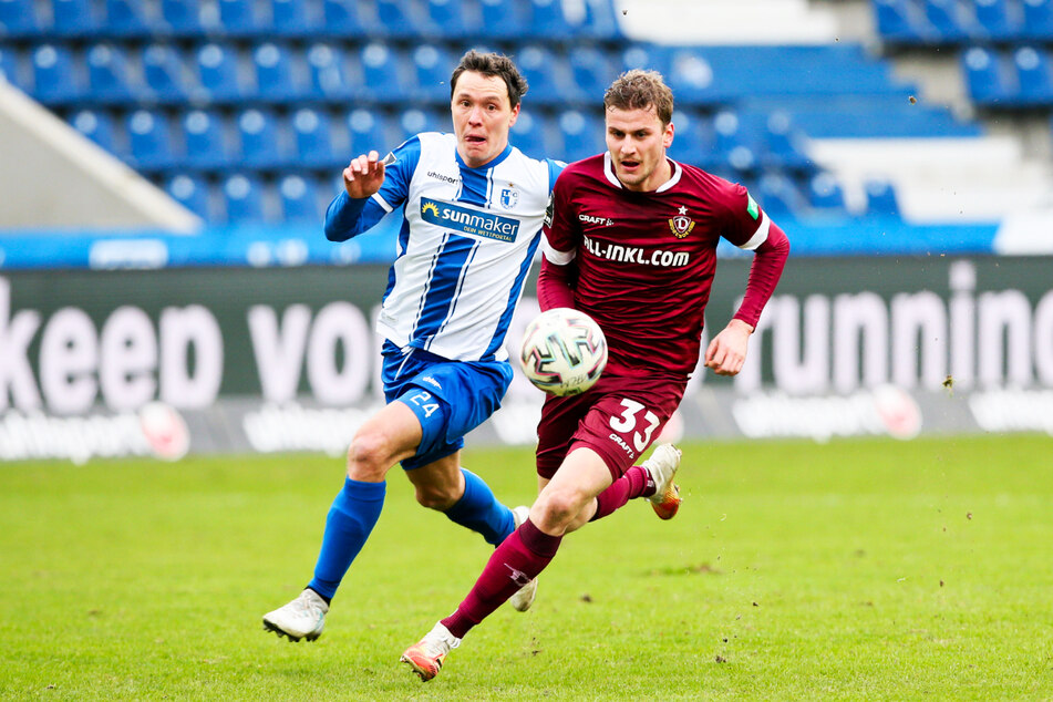 Dynamo-Stürmer Christoph Daferner (r.) hatte gegen die FCM-Defensive um Alexander Bittroff einen schweren Stand.
