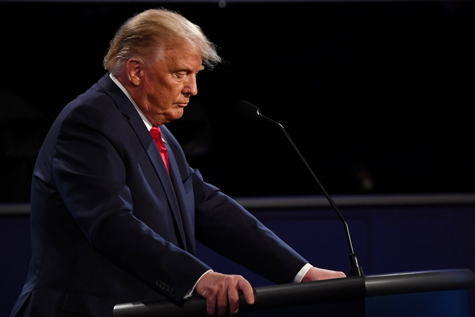 President Donald Trump listening to his opponent speak during the presidential debate.