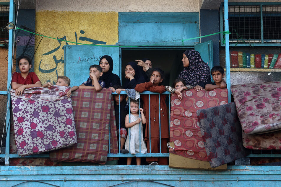 An Israeli air strike Wednesday hit a Gaza school, with the occupied territory's civil defense agency reporting 14 killed in the facility-turned-displacement shelter.