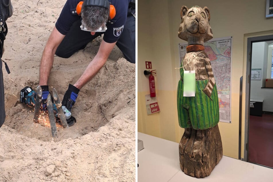 Ein Mitarbeiter der Technischen Einsatzeinheit trennt die Stahlrohre, mit denen Kater "Findus" (r.) zuvor befestigt gewesen ist, mithilfe einer Flex ab.