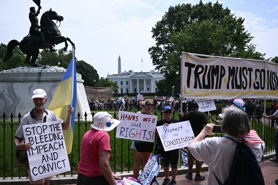 Demonstrators across the US gathered Thursday for May Day rallies against Donald Trump, protesting his administration's policies and attempts to push the limits of presidential power.