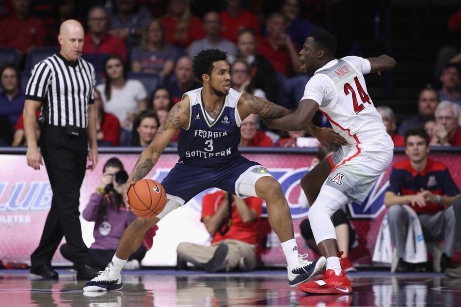 During the home opener, Georgia Southern basketball fans took part in the bizarre tradition of throwing toilet paper rolls onto the court after the team's first score.