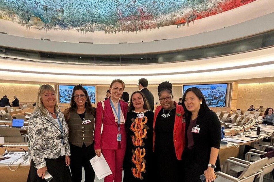 Abortion rights advocates pose for a picture with Human Rights Committee members Yvonne Donders of the Netherlands and Tijana Šurlan of Serbia.