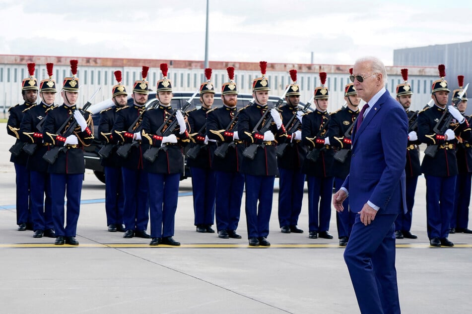 President Joe Biden is greeted by honor guard as he arrives at Paris-Orly Airport, France.