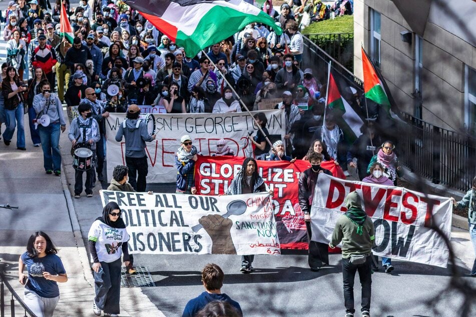 Students, faculty, and members of the community gather on the Georgetown University campus to demand the release of Dr. Badar Khan Suri and an end to US support for Israel's atrocities in Palestine.