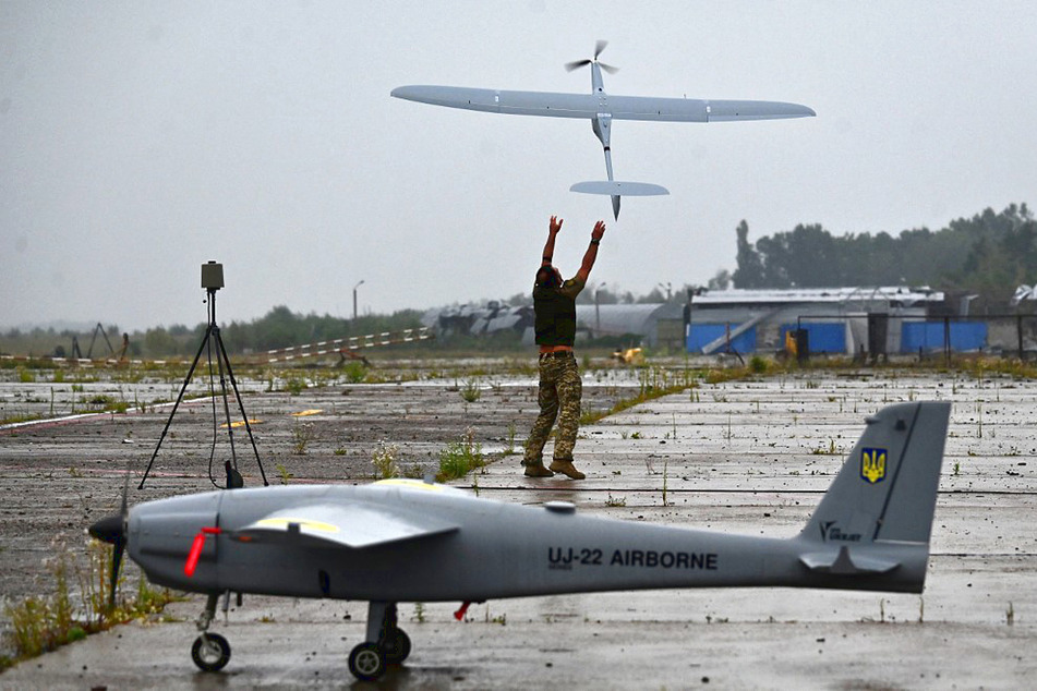 Drones need a pilot on the ground and sometimes someone to throw them into the air.