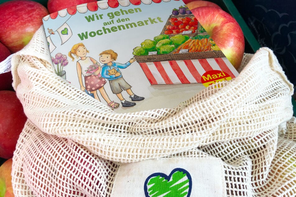 Anstelle von Plastiktütchen für Obst und Gemüse gibt es Baumwollnetze - und ein Kinderbuch über das Wochenmarkt-Erlebnis obendrauf.