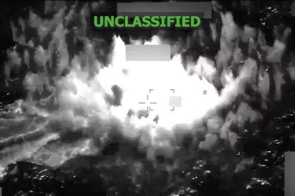 A screenshot from a video shared to X by US Southern Command on June 3, 2026, shows a boat in the Eastern Pacific engulfed by a large explosion after it is struck by American forces.