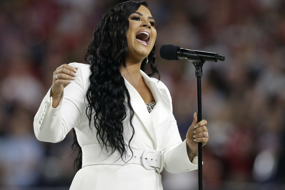 Demi Lovato sings the national anthem before Super Bowl LIV at the Hard Rock Stadium in Miami Gardens on February 2, 2020.