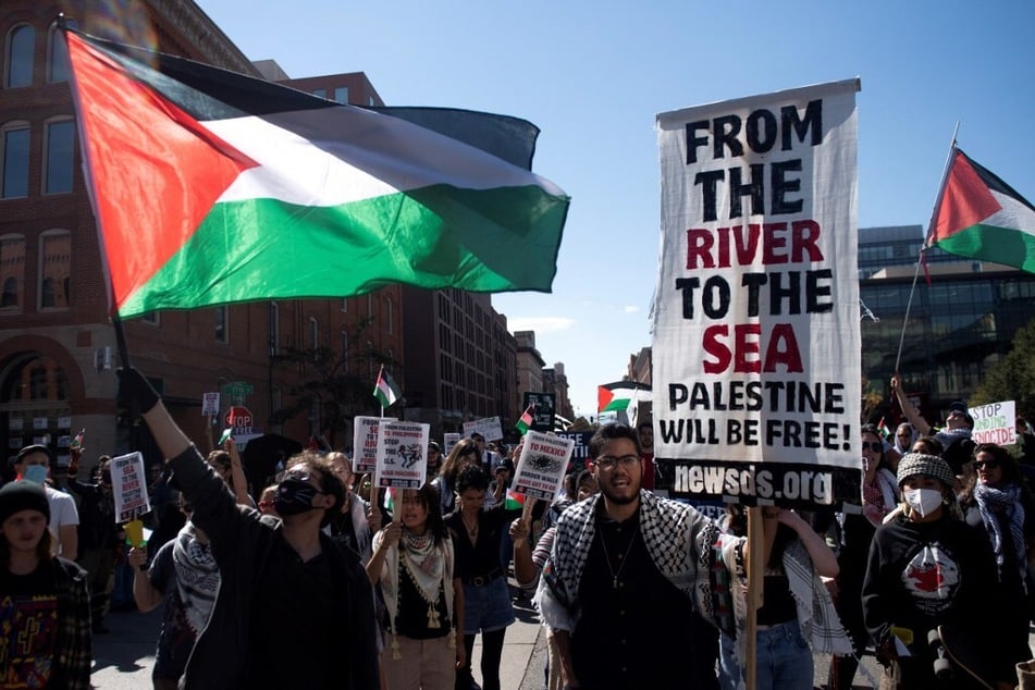 Demonstrators march for Palestinian liberation and an end to US military support for Israel in Denver, Colorado.