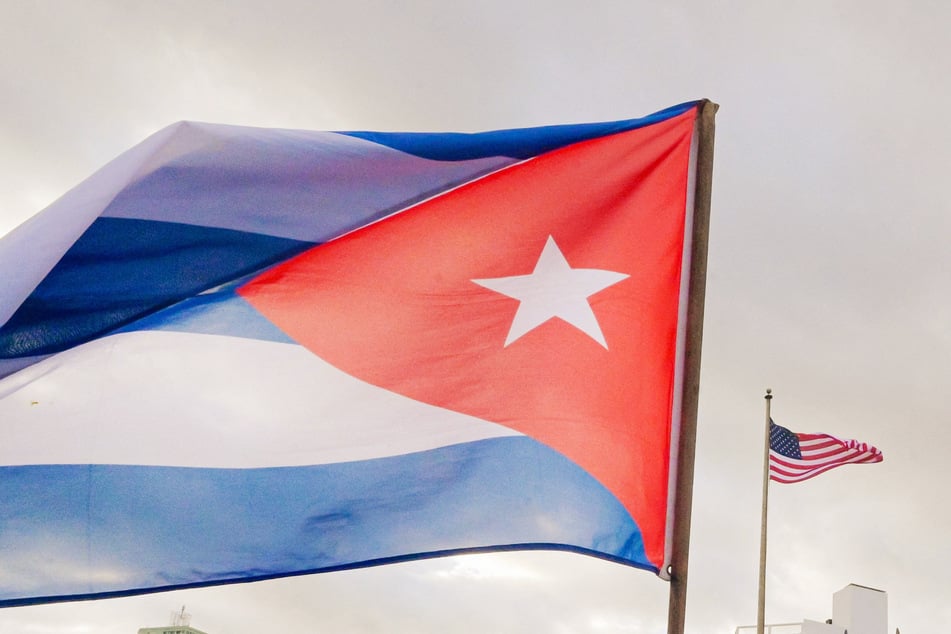 A Cuban protester waves a national flag during an anti-imperialist protest in front of the US Embassy in Havana on January 16, 2026.