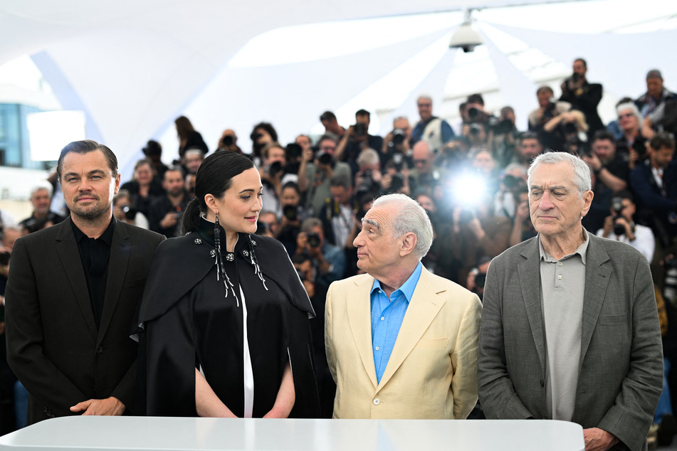 (L-R) Actor Leonardo Dicaprio, actor Lily Gladstone, director Martin Scorsese, and actor Robert de Niro at the 76th Cannes Film Festival in May 2023.