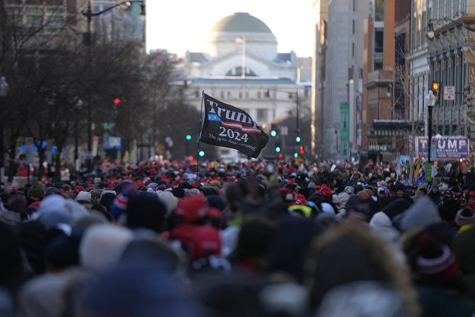 Supporters of President-elect Donald Trump await his inauguration on Monday in Washington, DC.