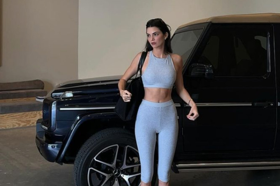 Kendall Jenner sparked a divide among fans with her interesting shoe choice in her latest pics.