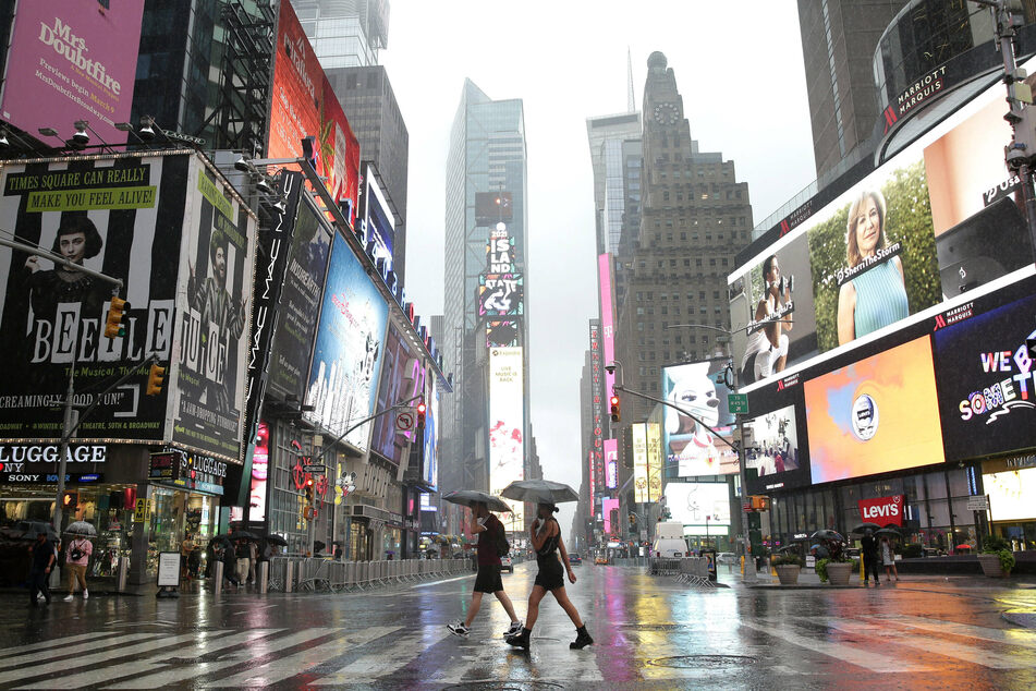 Times Square in NYC saw heavy rainfall on Saturday night and throughout Sunday, with parts of the city experiencing flooding.