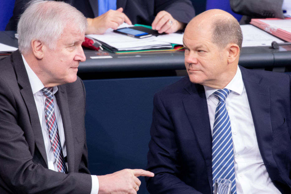 Horst Seehofer und Olaf Scholz im Bundestag.