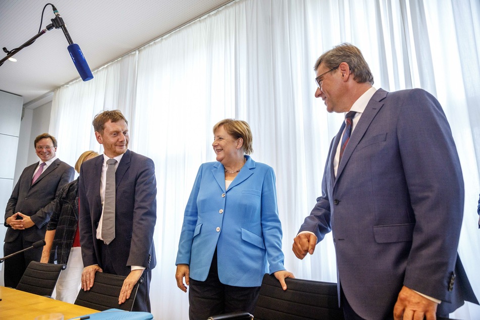 Angela Merkel (67, CDU), hier bei einer Fraktionssitzung im sächsischen Landtag im Jahr 2018, hat dem Freistaat Sachsen laut dessen Ministerpräsident Michael Kretschmer (46, CDU, vorn links) gutgetan. (Archivbild)