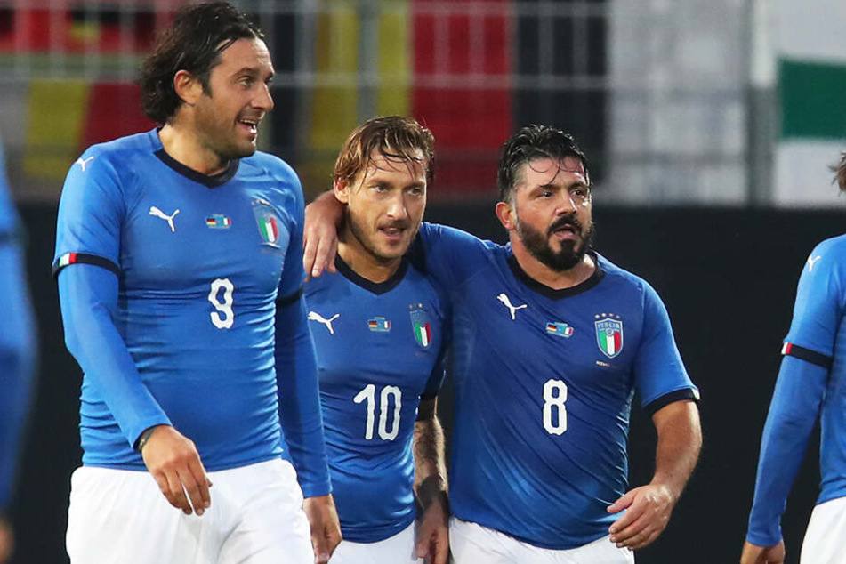 Luca Toni (l).