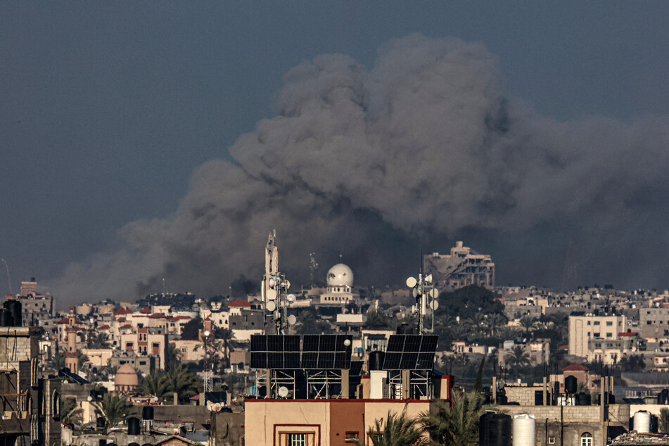 A picture taken from Rafah on Friday shows smoke billowing over Khan Yunis in the southern Gaza Strip during Israeli bombardment, amid continuing battles between Israel and the Palestinian militant group Hamas.