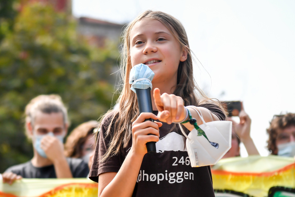 Greta Thunberg, 18 anni, attivista per il clima svedese, tiene un discorso durante una manifestazione del movimento "Venerdì per il futuro" a Milano.  Durante lo stesso evento, è stata vista tra le braccia di uno sconosciuto.