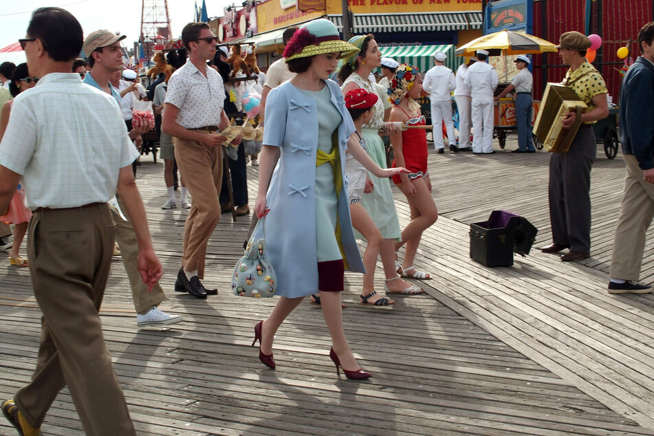 Rachel Brosnahan (c.) and the cast of The Marvelous Mrs. Maisel filmed season four at Coney Island amusement park in New York, transformed into an early 1960s setting.