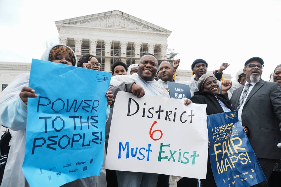 People gather outside of the US Supreme Court following arguments heard in Louisiana v. Callais on March 24, 2025.
