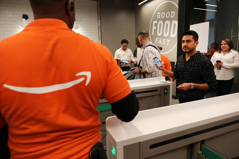 Customers shop at the Amazon Go store at Brookfield Place in downtown New York.