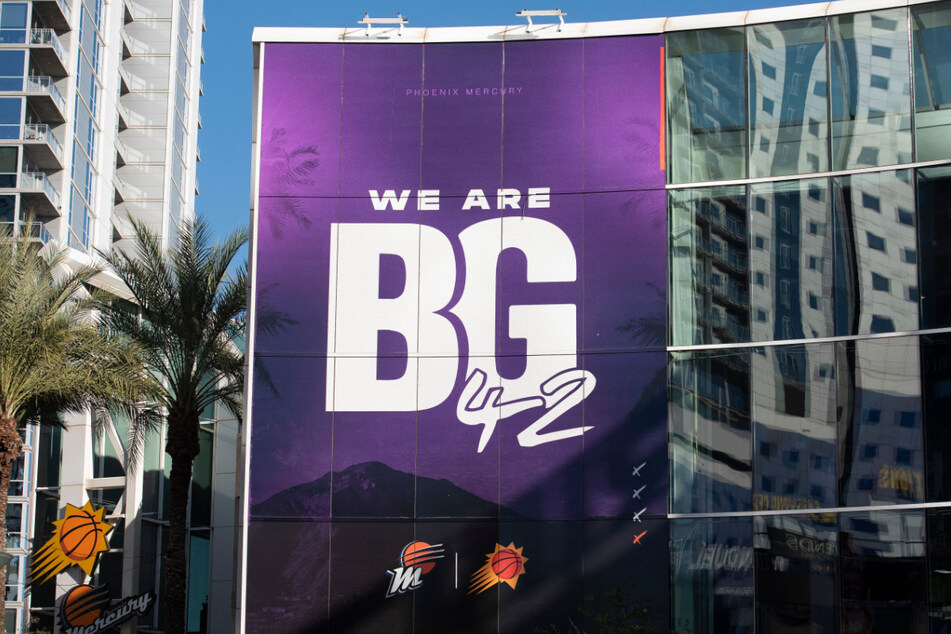 A sign reading "We are BG #42" hangs on the facade of the Footprint Center in Phoenix, Arizona, where WNBA star Brittney Griner will make her debut for the Phoenix Mercury once again this May.