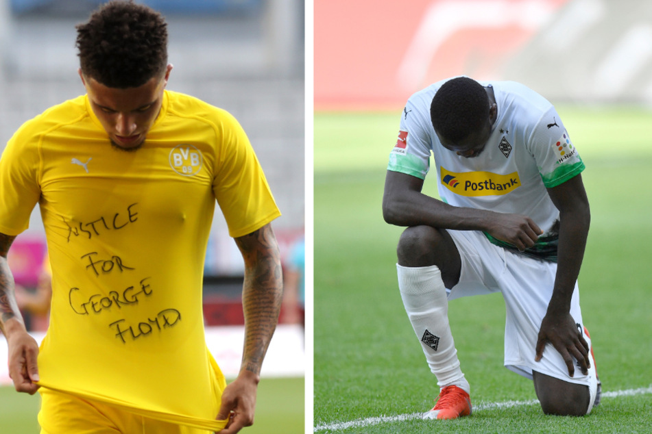 Der Dortmunder Jadon Sancho und der Gladbacher Marcus Thuram präsentieren T-Shirt-Botschaften für George Floyd.