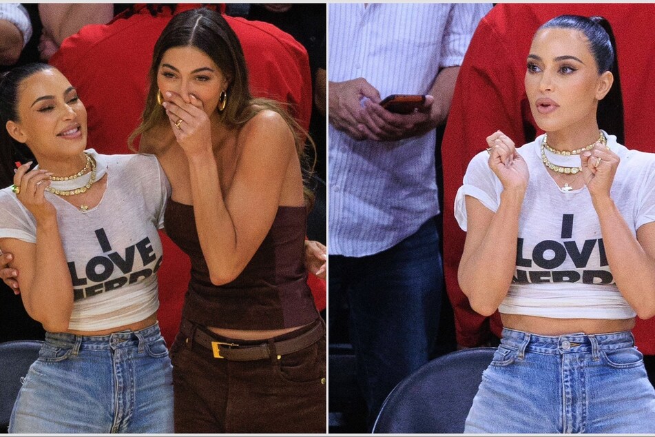 Kim Kardashian (r) made an interesting fashion statement while attending the Lakers playoff game!