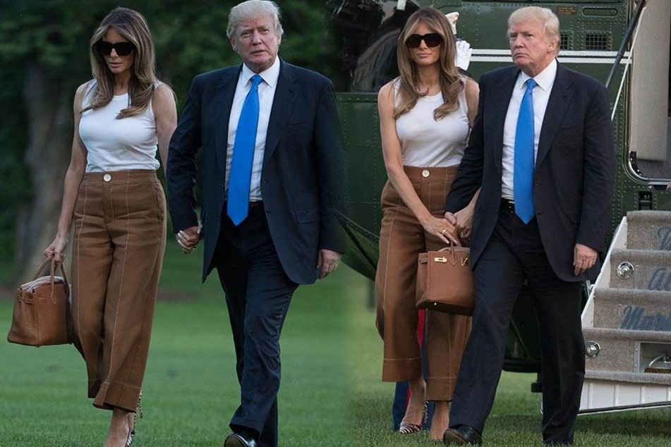 Melania und Donald Trump am 11.6.2017 in Washington. Ihre Tasche wollte Melania ganz offensichtlich selbst tragen.