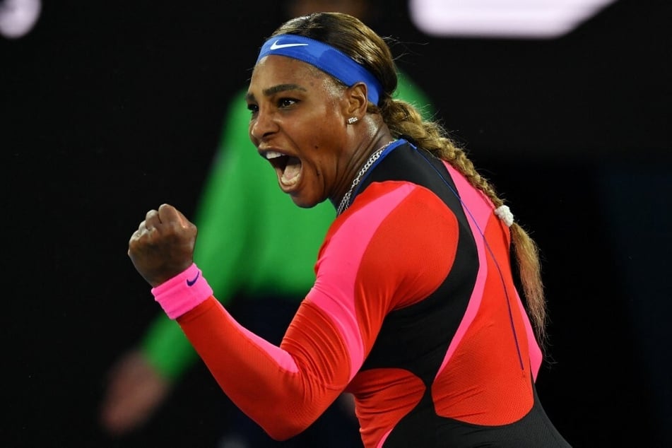 Serena Williams reacts as she plays against Romania's Simona Halep during their women's singles quarter-final match on day nine of the Australian Open tennis tournament in Melbourne in February 2021.