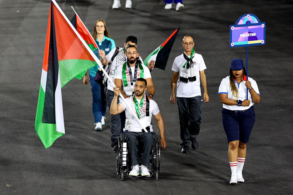 Fadi Aldeeb leads the Palestinian contingent during the opening ceremony of the 2024 Paralympic Games in Paris, France.