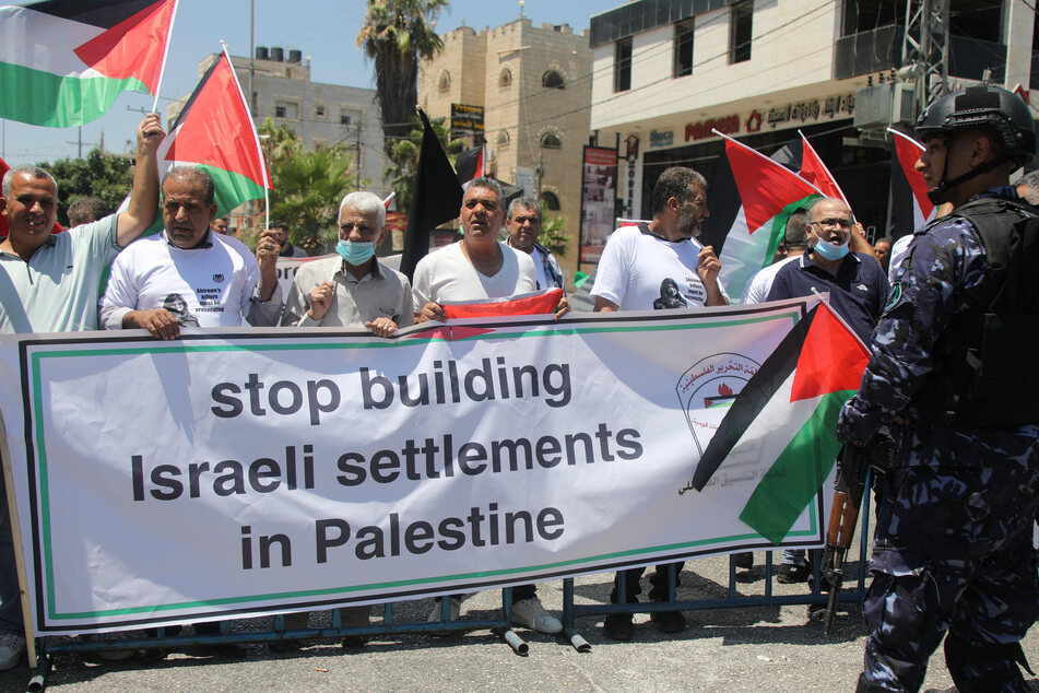 Palestinians protest President Biden's visit to the occupied West Bank.