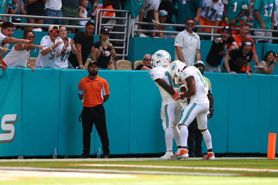 Miami Dolphins receiver Tyreek Hill celebrated his touchdown against the Jacksonville Jaguars by reenacting his arrest with teammate Jaylen Waddle.