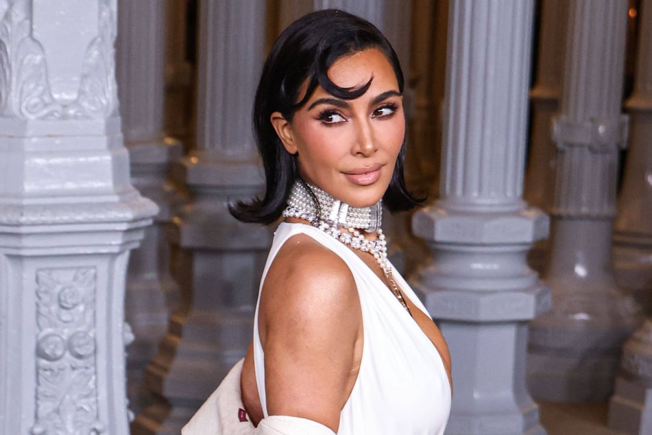 Kim Kardashian has stirred up controversy after rocking a rosary in her new SKIMs x Dolce &amp; Gabbana campaign.