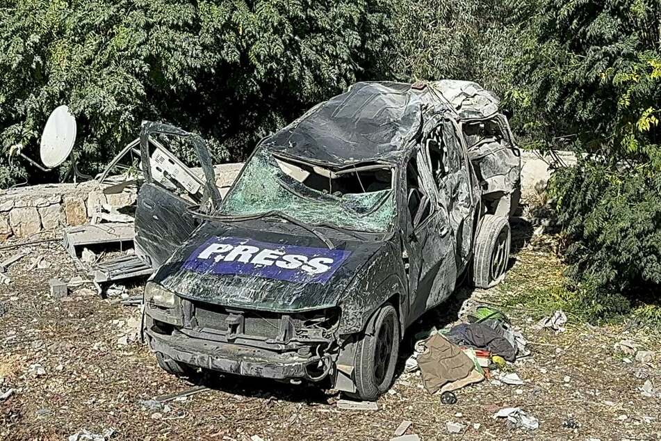 This picture shows a car marked "Press" at the site of an Israeli airstrike in the southern Lebanese village of Hasbaya on October 25, 2024.