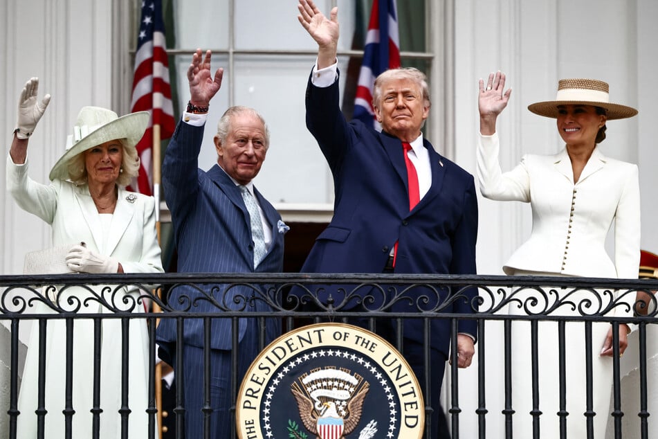 (From l. to r.) Queen Camilla, King Charles, President Trump, and First Lady Melania Trump waved the crowds on the White House lawn.
