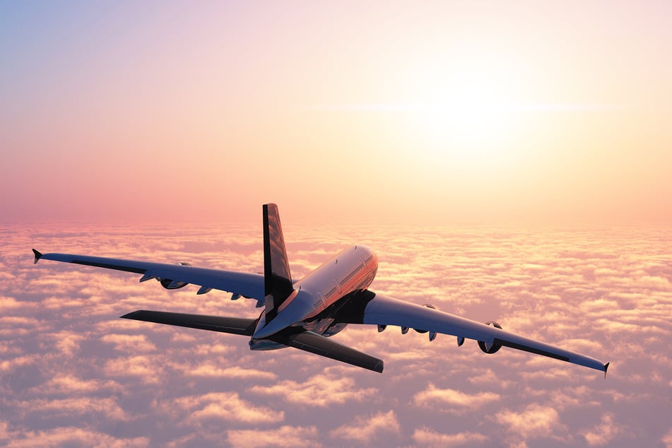 An aircraft above the clouds (stock image).