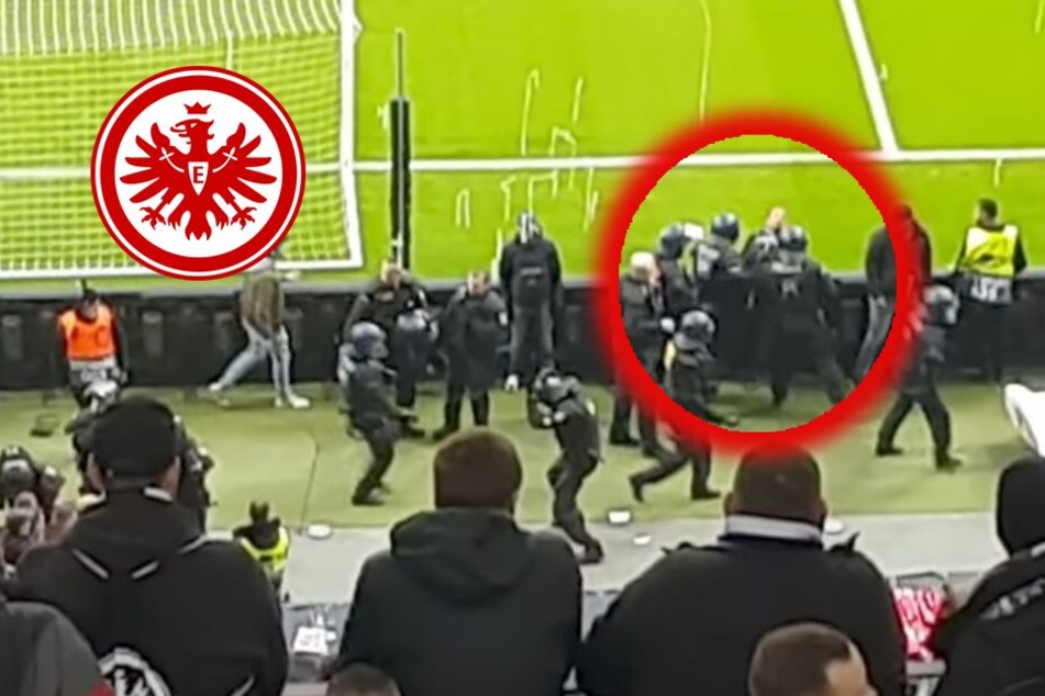 Der Bildausschnitt aus dem Youtube-Video zeigt ganz klar, wie Beamte auf einen an der Bande stehenden Fan losgehen.