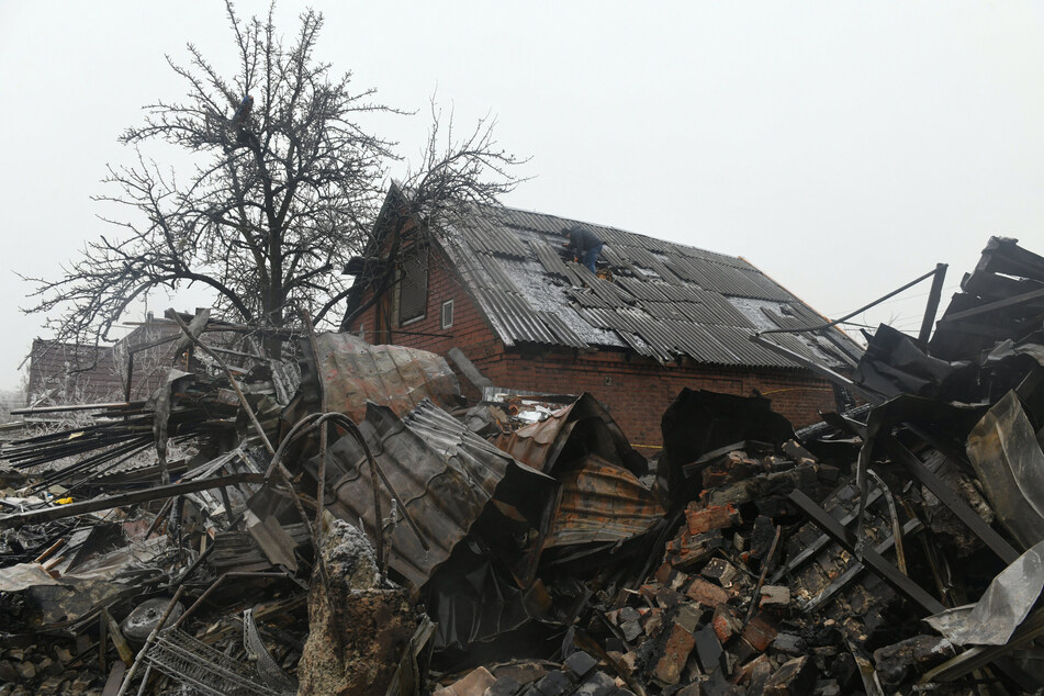 The aftermath of recent shelling on Friday in Yasynuvata, Russian-controlled Ukraine, amid the Russia-Ukraine war.