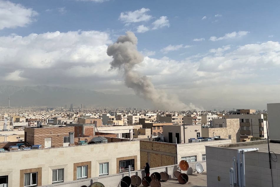 Smoke rises above Tehran after Israel launched airstrikes on Iran with US participation on Saturday morning.
