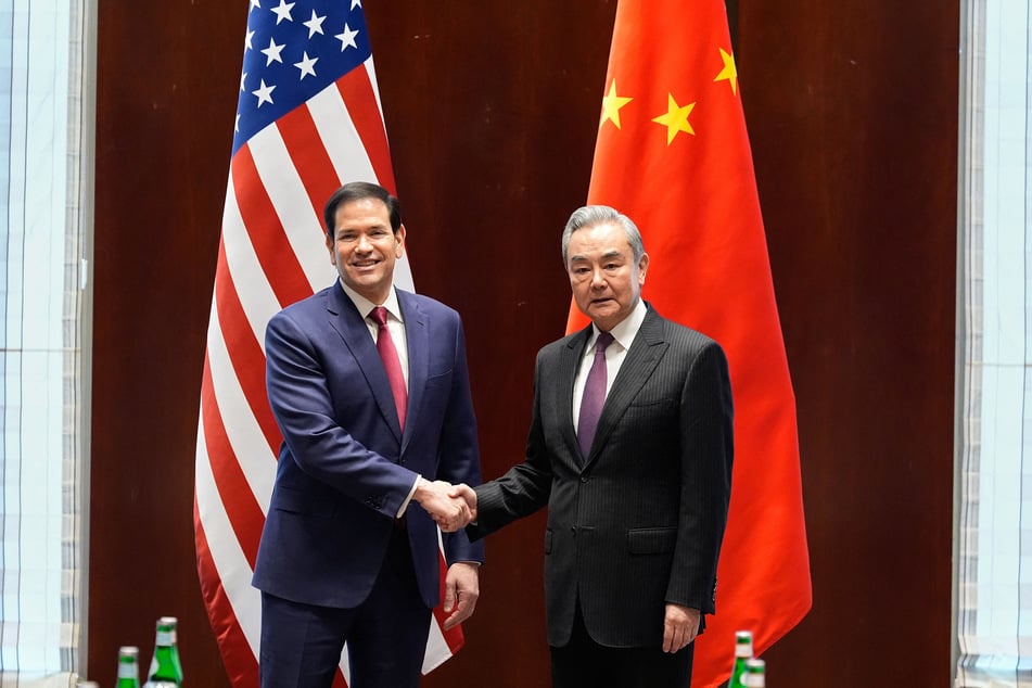 President Donald Trump's comments on Taiwan came days after Chinese Foreign Minister Wang Yi (r.) met with US Secretary of State Marco Rubio.