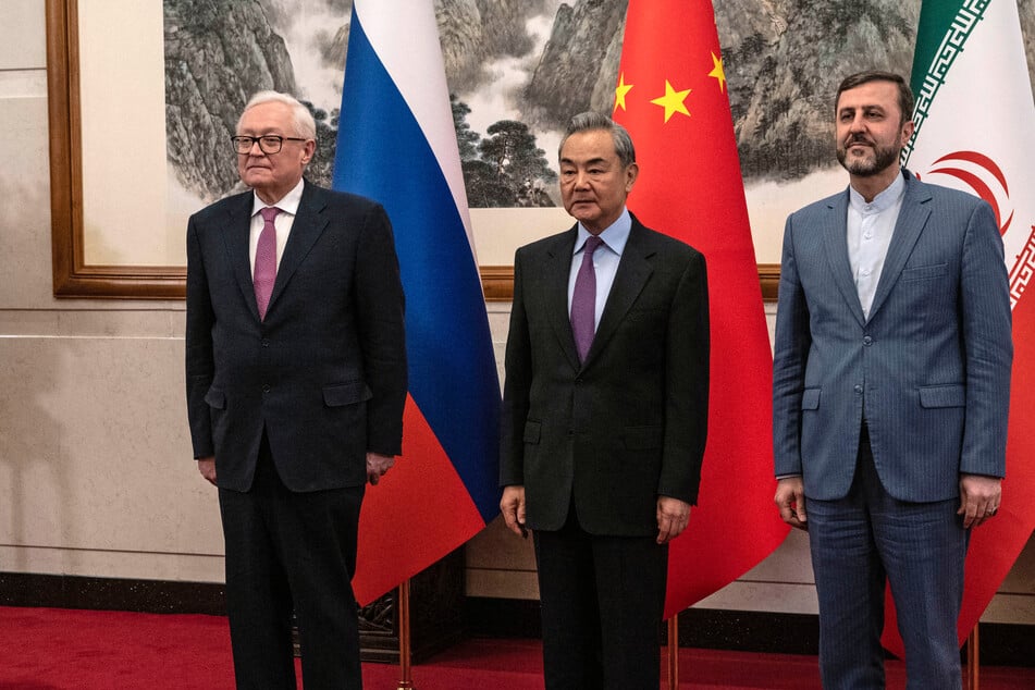 China has joined with Russia to support Iran as the US calls for a dialogue with Tehran over its controversial nuclear program.