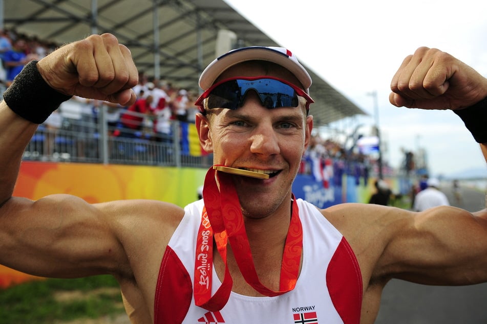 Olaf Tufte 2008 in Peking mit seiner Goldmedaille zwischen den Zähnen. (Archivfoto)