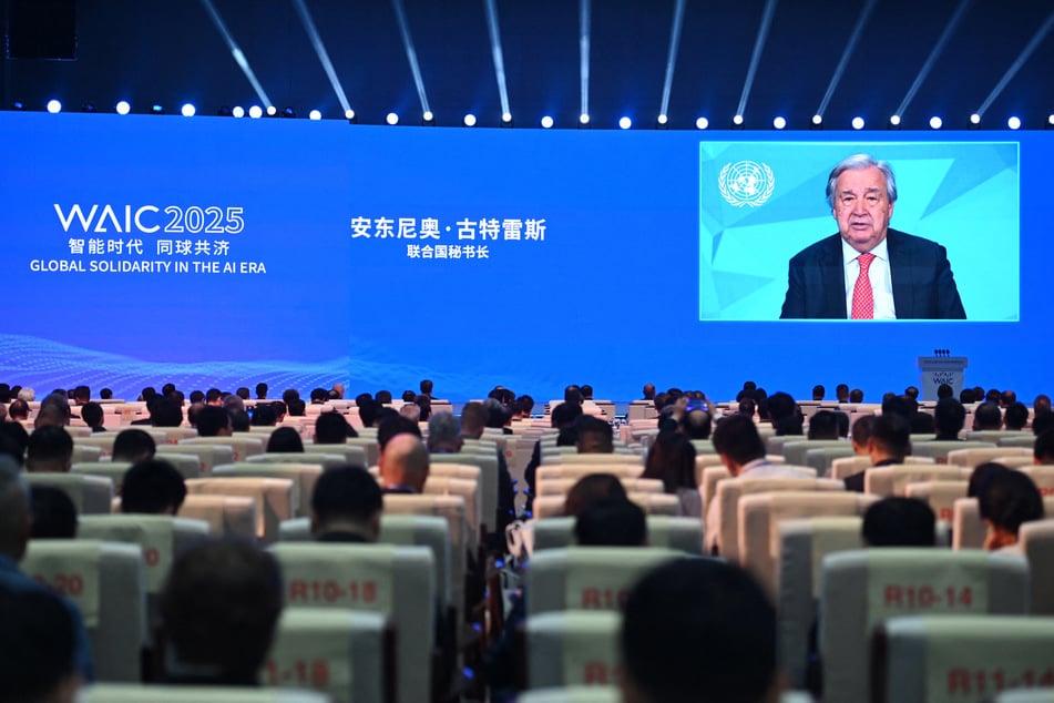 UN Secretary-General Antonio Guterres appears on a screen as he speaks remotely at the opening ceremony of the World Artificial Intelligence Conference in Shanghai, China, on July 26, 2025.