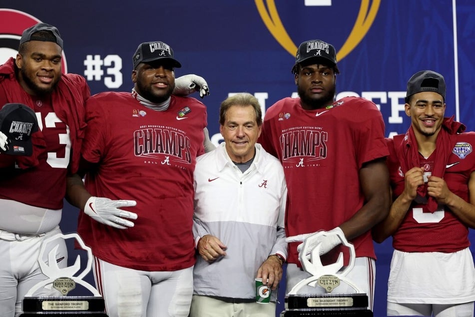 Nick Saban's (c.) million-dollar move has college football fans up in arms.