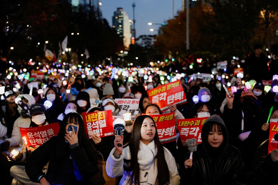 Protesters take part in a rally calling for the impeachment of South Korean President Yoon Suk Yeol near the National Assembly in Seoul.