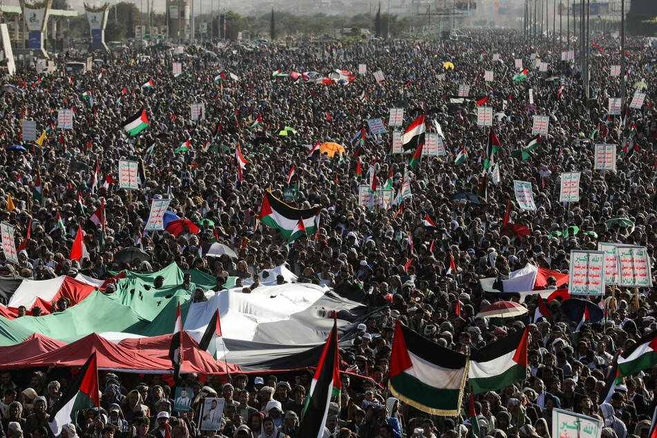 Protesters rally in solidarity with the Palestinians in the Gaza Strip in Sanaa, Yemen.